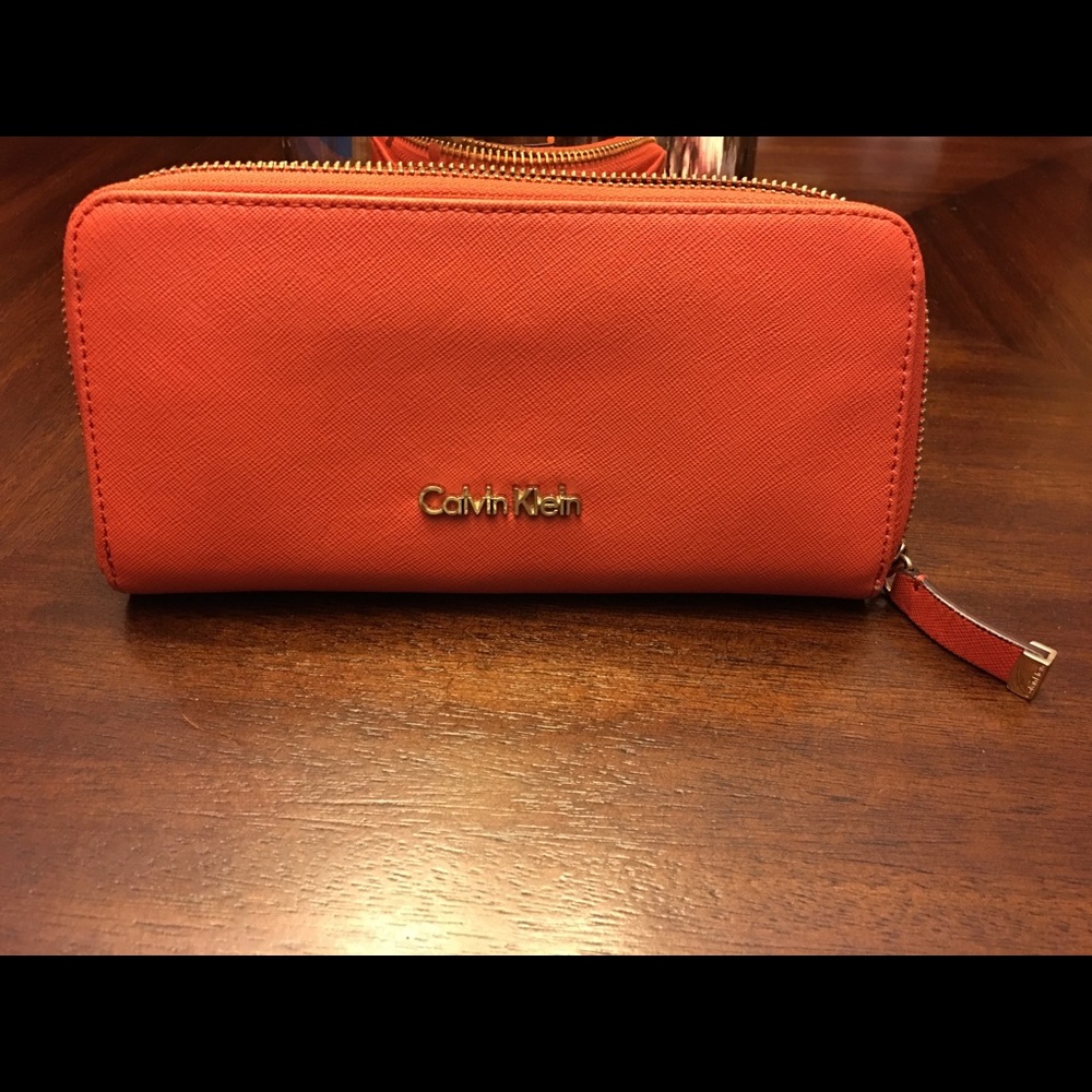 Calvin Klein Wallet. Beautiful orange. Pre loved.
